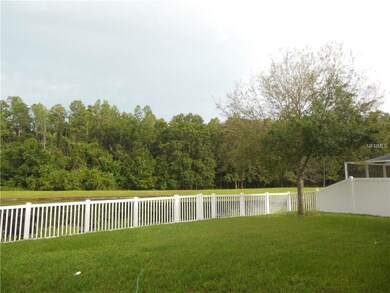 Rear Yard is fenced ~ overlooking pond