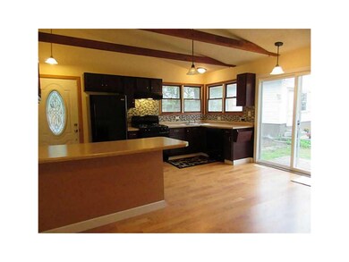 Kitchen. Large eat in kitchen with tall ceiling, n