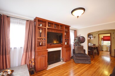 Living Rm w/custom built-in & fireplace