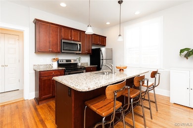 Kitchen with appliances with stainless steel finis