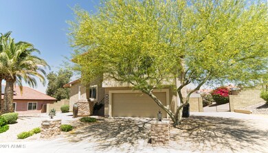 Front w/ RV parking and gate