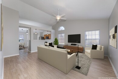 GREAT ROOM: Large Great Room features all new paint, new LVP Flooring, new Blinds and Ceiling Fan.