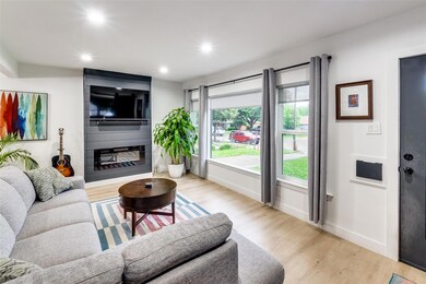Living room featuring light hardwood / wood-style 