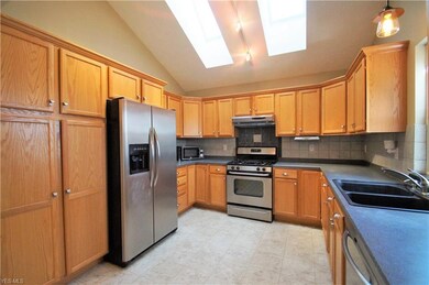 Large kitchen with plenty of cabinet space and cou