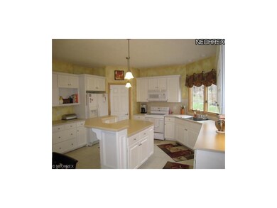 Beautiful and bright kitchen with breakfast bar an