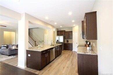 Oversized Island in Kitchen with ample cabinets.