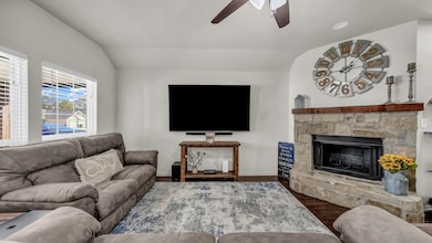 Living room with stone fireplace