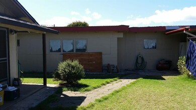 Exterior of extra storage room in back of attached