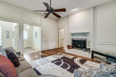 Living area which is open to the dining room and e