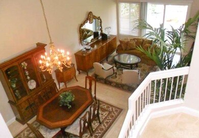 Vaulted ceilings, skylight and large windows throu