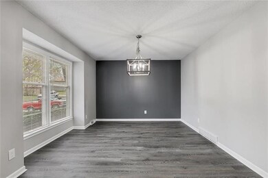 Dining Room with new two tone paint, new flooring 