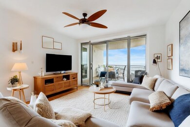 Elegant neutral tile flooring seamlessly extends t