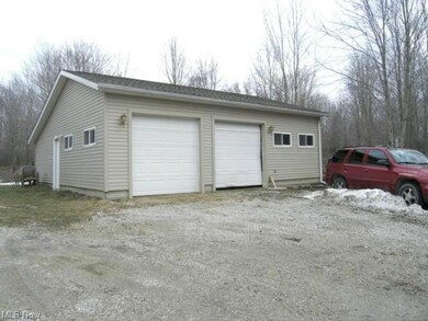 Detached deep 2 1/2 car garage