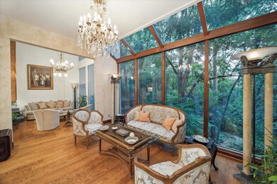 The lovely sunroom with breathtaking views of sere