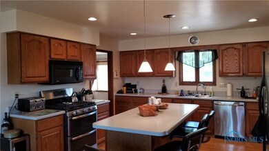 An open kitchen/dining room combination with lots