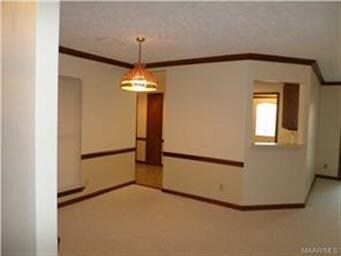 Looking from family room into the open dining room