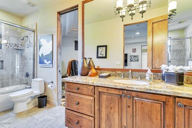 Bathroom between home theatre and home g