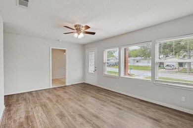 Living room and a view of the door to bedroom 1