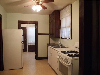 Kitchen. Original charm. Kitchen has access to sun