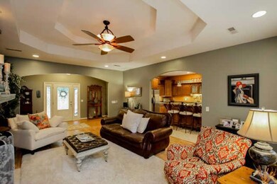 View of the front door from the living room.  A spacious open floor plan, great for entertaining!