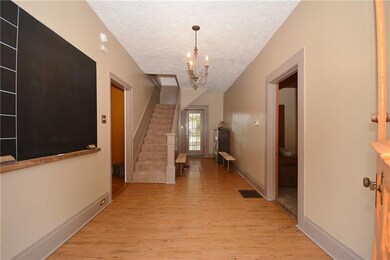 Fun entry w/ chalkboard wall, lockers & benches