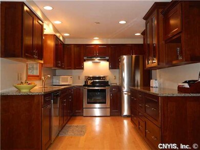 Kitchen. Beautiful new cherry kitchen with granite
