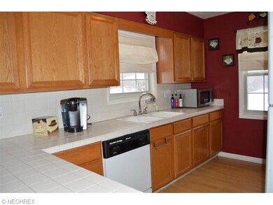 Both the kitchen and dining area feature attractiv
