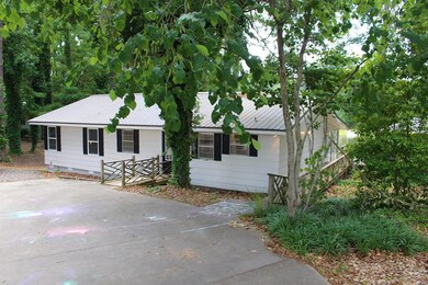 This Cottage is Nestled into a wooded tract
