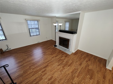 View of living room coming up the stairs.