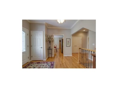 Gleaming hardwoods welcome you into this charming 