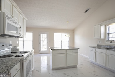 Kitchen facing Breakfast Area