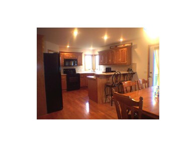 Kitchen with corian counters, integrated sink and 