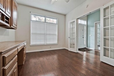 Large office or media room has built-ins.