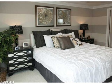 Bedroom - Photo is of similar home in community.