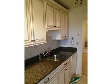 Kitchen. Newly renovated galley kitchen showing ne