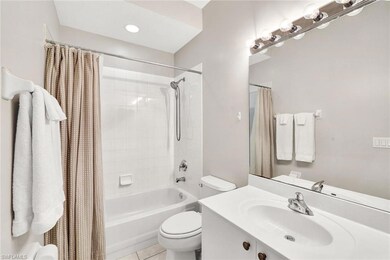 Full bathroom featuring tile patterned flooring, s