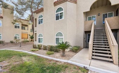 View of property featuring stairs
