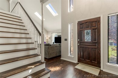 The lovely entryway greets you with soaring vaulte
