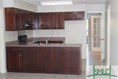Large Open Kitchen right off Garage