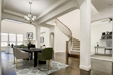 Dining space with crown molding, stairs, an inviti