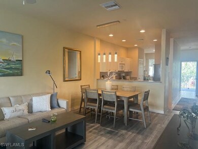 Dining space featuring wood finished floors and re