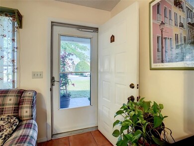 Looking at the front door from living room