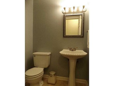 Partial Bath. Located in the hallway just off the 