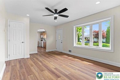 Living room - new laminate flooring, new lighting,