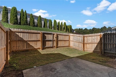 View of fenced backyard