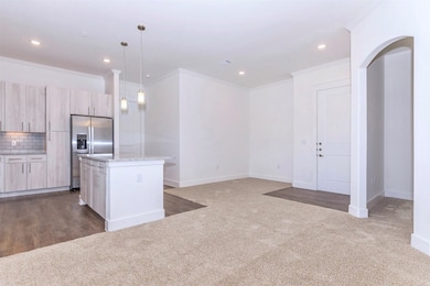Kitchen with SS appliances, granite countertops, a