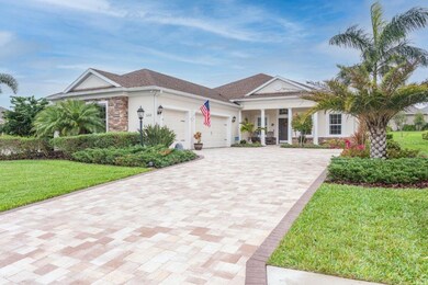 Beautiful paver driveway and three car garage