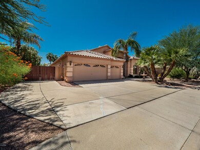 FRONT W/3CAR GARAGE