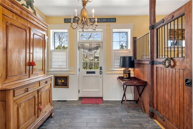Original features in entry hall retain Carriage Ho