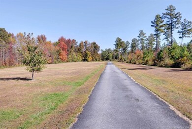 Long, paved driveway